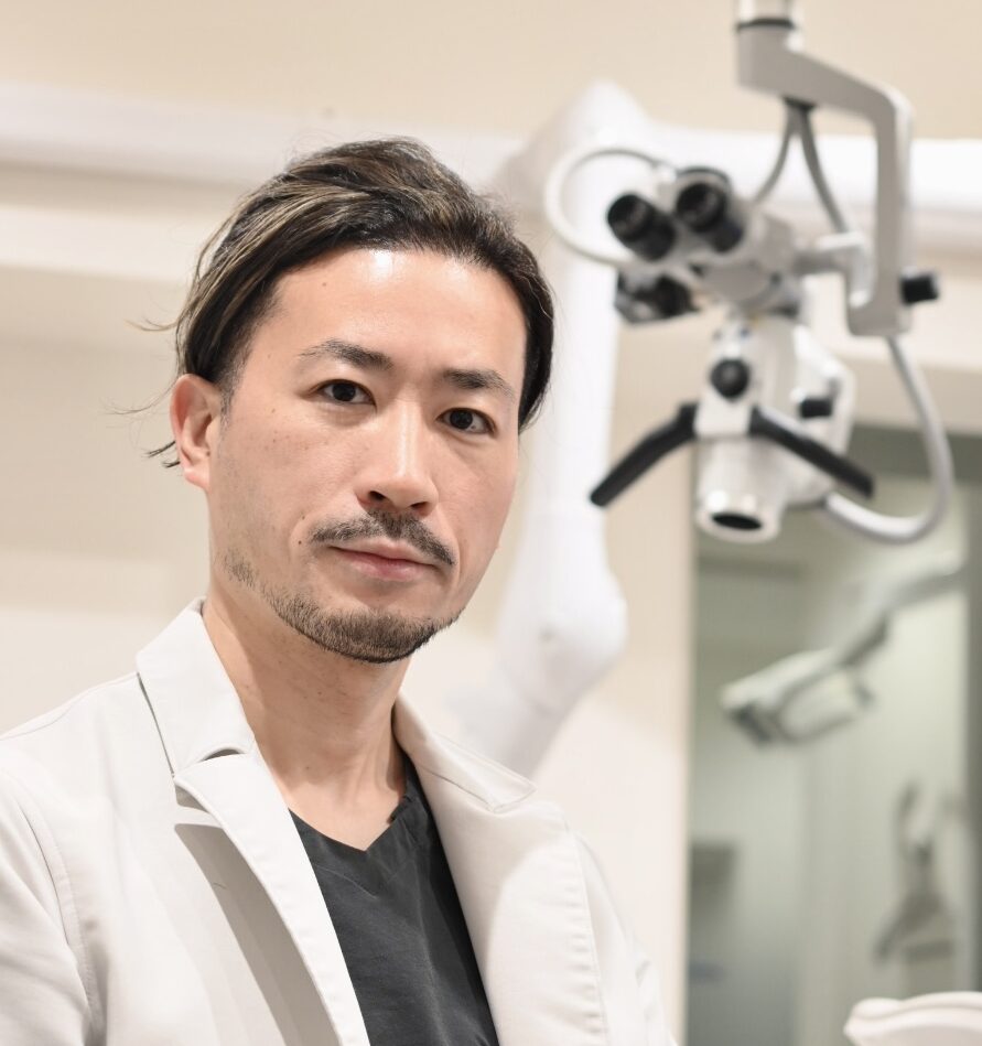 作間　正和